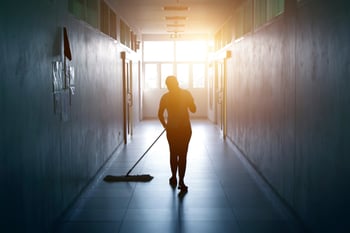 Woman janitor in a school