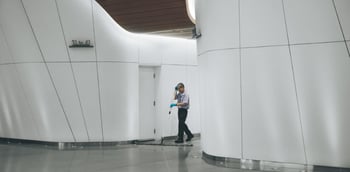 Janitor-mops-office-floor